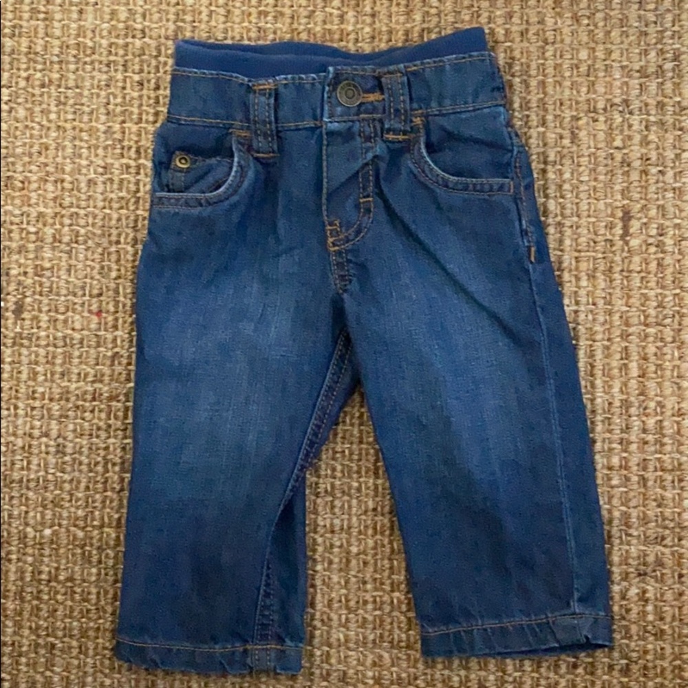 Carter’s baby jeans in a dark wash. Size 6 months.